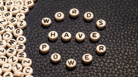 Words have power on circle plastic blocks.の写真素材
