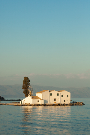 Vlacherna Monastery in Corfu island near Kanoni hill during a sunsetのeditorial素材