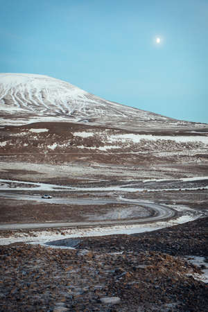 Serpentine road near mountains in Iceland, near LangjÃ¶kull glacierの写真素材