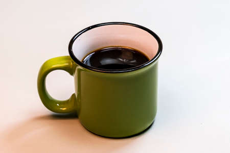 Detail a delicious cup of coffee. Photographed in studio