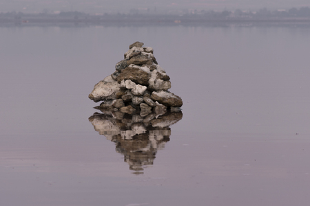 Mound of stones in the pink lake of Torrevieja, Spainの写真素材