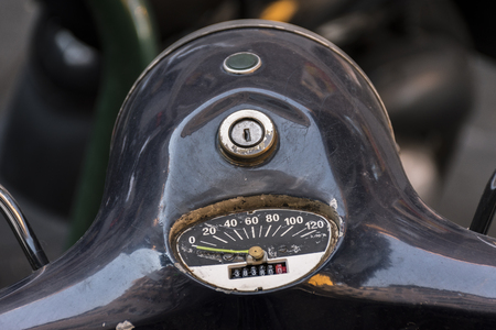 Detail of a tachometer of an old motorbike. Photographed in one of the old streets of the city of Madridの写真素材