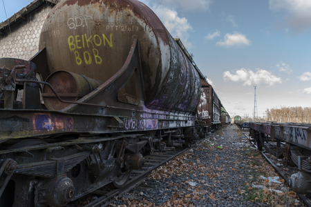Urbex. Rusty and abandoned train cars. In an abandoned train station