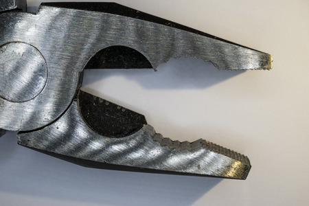 close up of pliers, on a white background