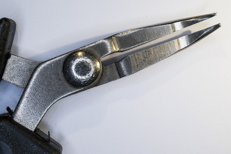 close up of pliers with fine tip, on a white background