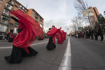 Carnival parade. Madrid, February 9, 2018. Spain. Women in disguise dancing
