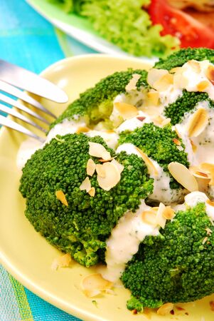 salad from broccoli with garlic sauce and almonds flakesの写真素材