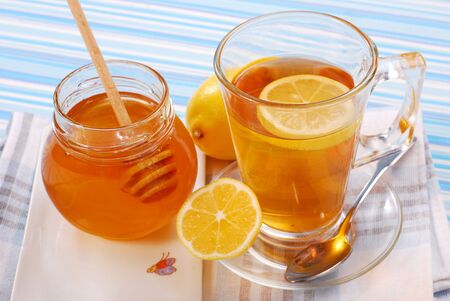 tea with lemon and honey as natural medicineの写真素材