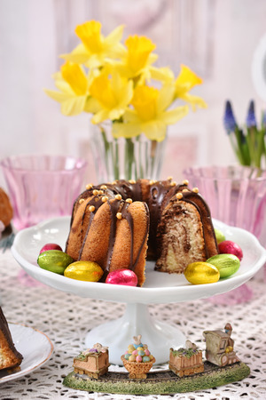 easter traditional marble ring cake with beautiful decorations  on festive table