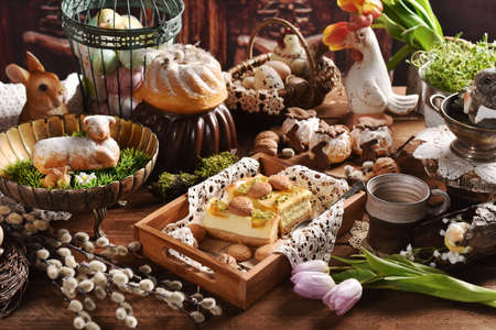 Traditional Easter pastries- cheesecake with passion fruit, ring cake, muffins and lamb shaped cake...