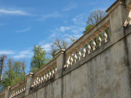 Detail of an ancient baroque balaustrade over blue skyの写真素材