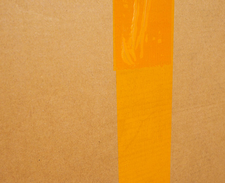 Brown corrugated cardboard parcel useful as a backgroundの写真素材