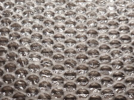 plastic wrap texture useful as a backgroundの写真素材