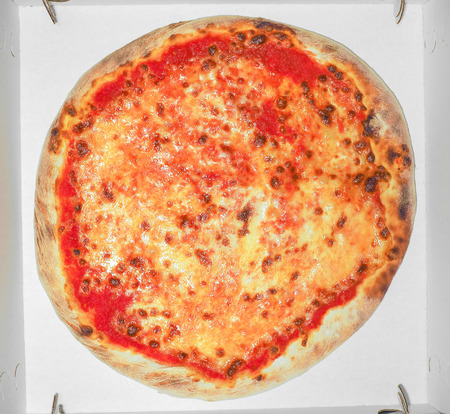 Margherita aka margarita pizza traditional Italian food in carton boxの写真素材