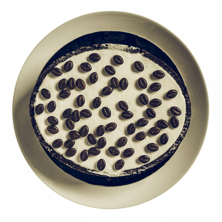 Vintage faded Chocolate and coffee ice cake birthday party pie isolated over white backgroundの写真素材