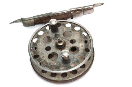 The coil for a fishing tackle on a white backgroundの写真素材