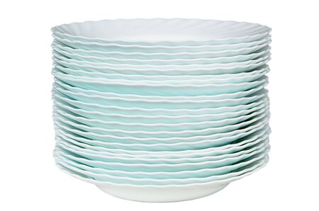 Beautiful white plates on a white backgroundの写真素材