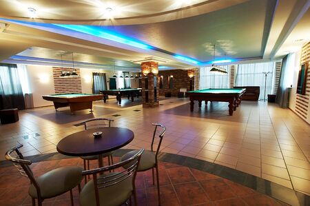Billiard room and cafe in modern hotelの写真素材