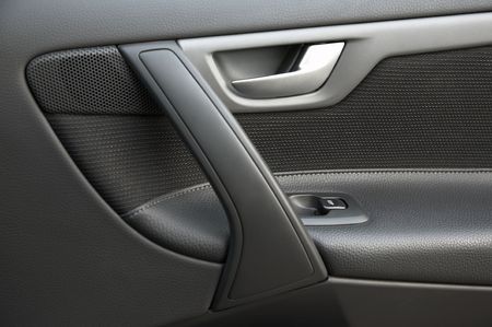 Door of the car with the lift of glassの写真素材