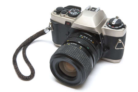 The old reflex camera on a white background