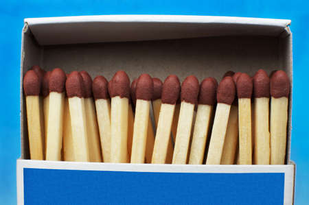 Box with matches on a dark blue background