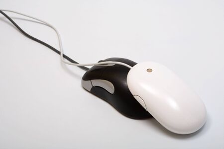 two mouse with a wheel on a grey background