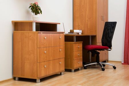 New laptop on a table at modern officeの写真素材