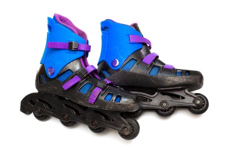 old roller skates on a white background