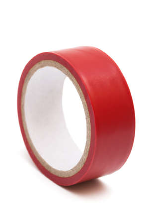 red electrical tape on white backgroundの写真素材