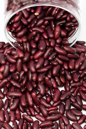 haricot in a glass jar on white backgroundの写真素材