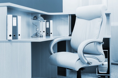 white leather armchair in a modern officeの写真素材