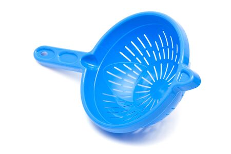 plastic colander blue on a white backgroundの写真素材