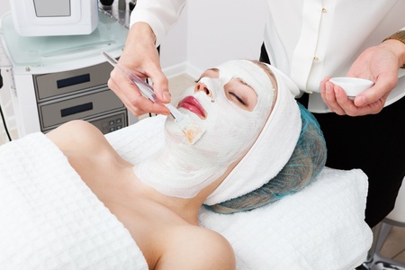 laying of cosmetic masks in modern beauty salonの写真素材