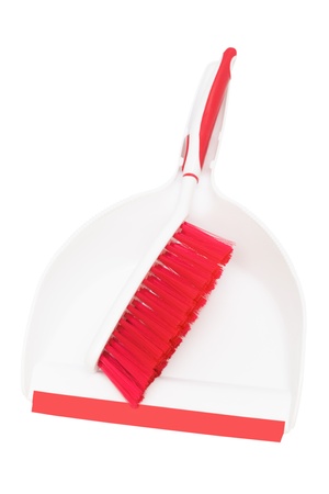 dustpan and brush on a white backgroundの写真素材