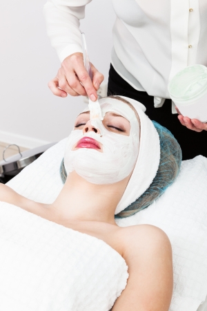 laying of mudpack in modern beauty salonの写真素材