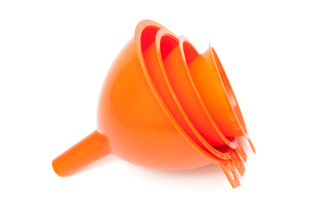 orange funnel for liquids on white backgroundの写真素材