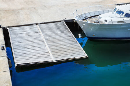 modern yacht docked in the portの写真素材