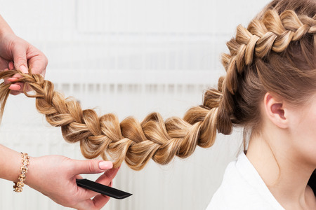 weave braid girl in a hair salonの写真素材