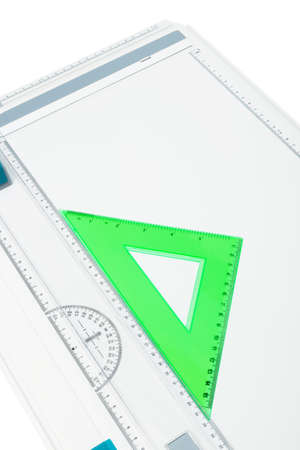 drawing board with a triangle on a white backgroundの写真素材