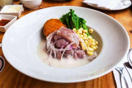 ceviche on a plate in a restaurantの写真素材