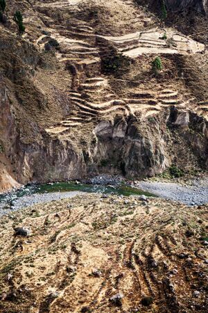 terrace on the bank of a mountain riverの写真素材