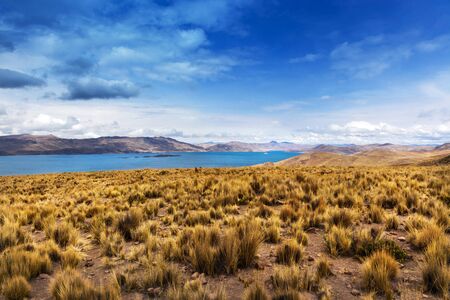 lake in the mountains on a cloudy dayの写真素材