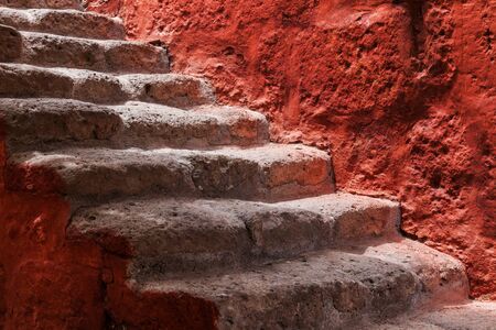 beautiful old steps and red wallの写真素材
