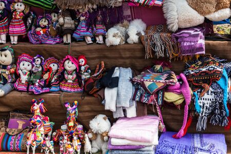 peruvian clothes and toys on the marketの写真素材