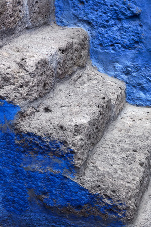 beautiful ancient steps and blue wallの写真素材
