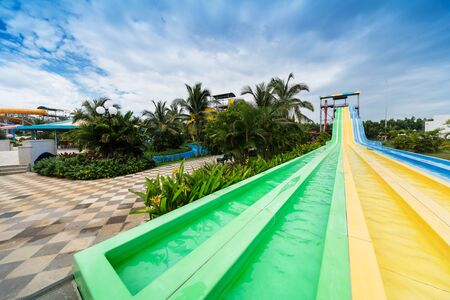 water slides in tropical aqua parkの写真素材
