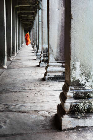 buddhist monk in the temple of Angkor Watの写真素材