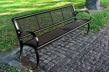 beautiful metal bench in the park