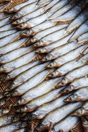 smoked fish at a street marketの写真素材