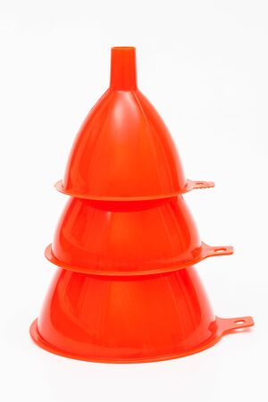 three red funnels on a white backgroundの写真素材